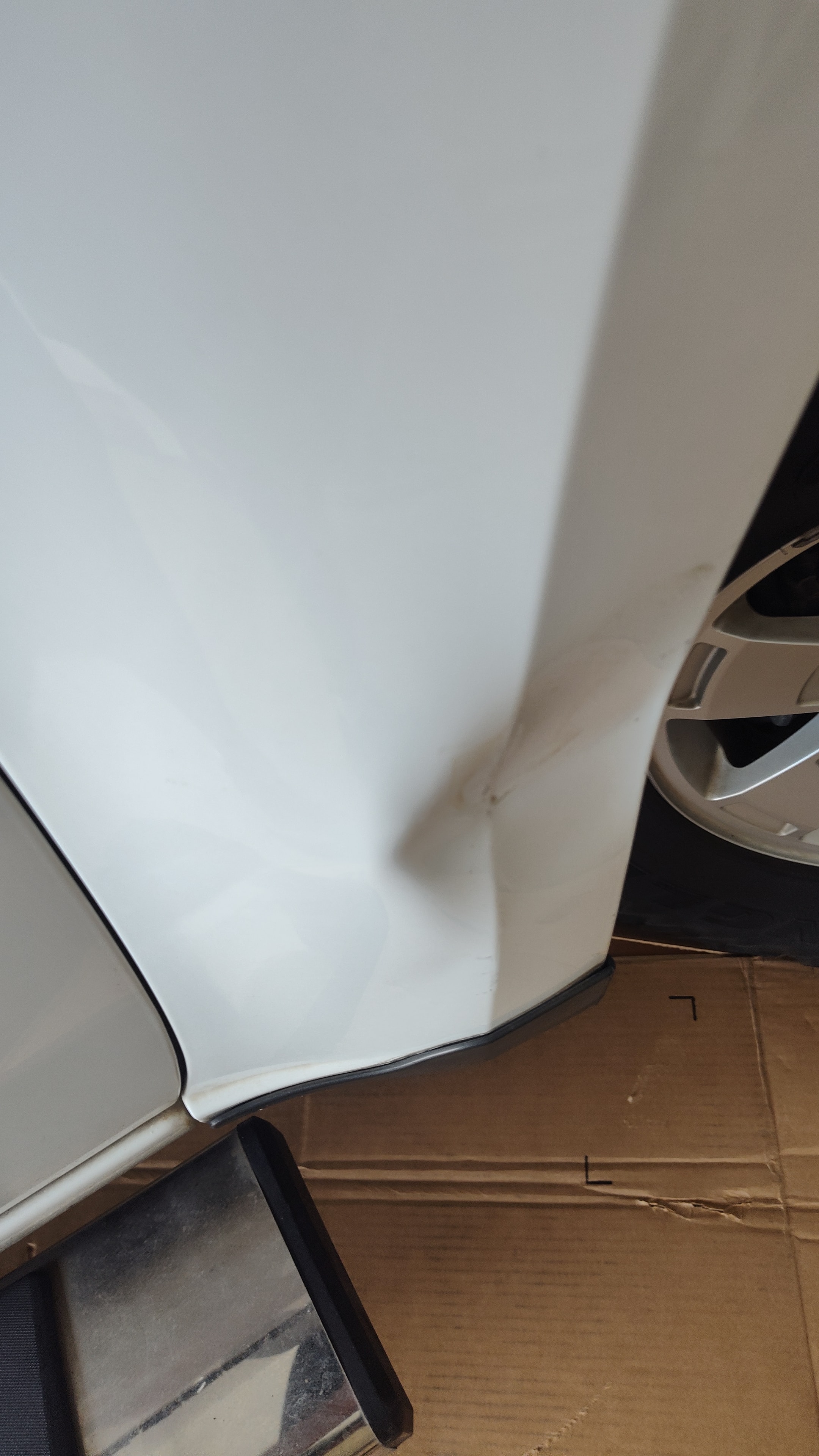 Car before repair — visible damage